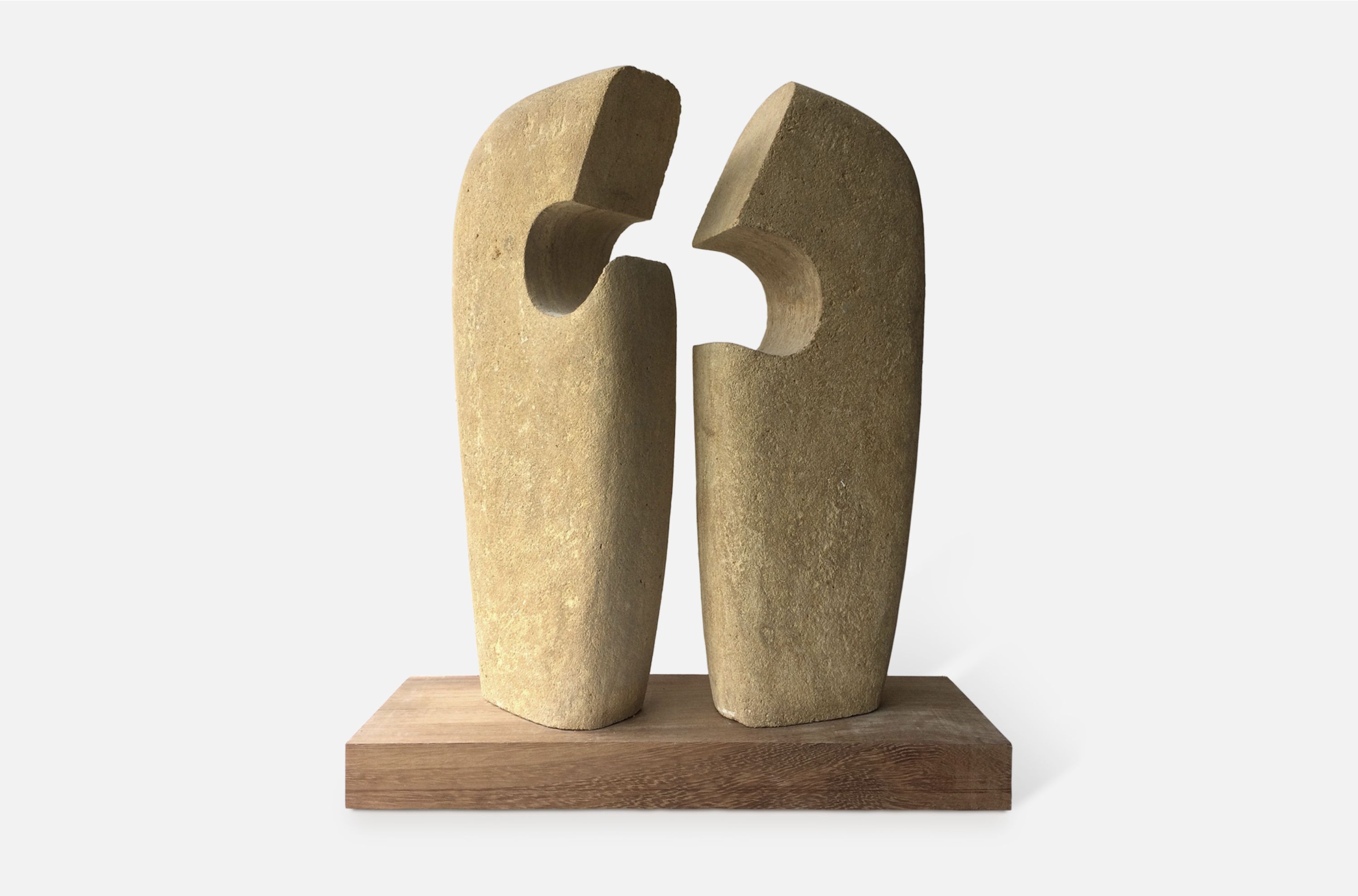 Bernard McGuigan, (b.1956), Communication/Conversation Piece, 2014-15, limestone on hardwood base, 45 x 20 x 20 cm.